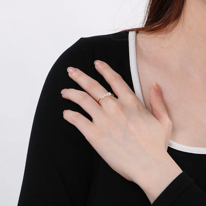 Gouden parel bedelring