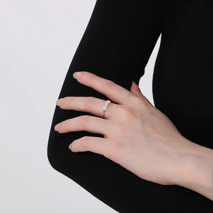 Gouden parel bedelring